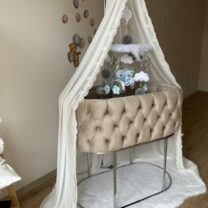 Quilted Crib, Musical Toy and Mosquito Net